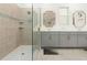 Spa-like bathroom with double vanity and a large walk-in shower at 1829 Tropical Palms Cir Cir, Kissimmee, FL 34747
