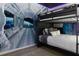 Space-themed bedroom with bunk beds and mural at 1829 Tropical Palms Cir Cir, Kissimmee, FL 34747