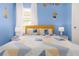 Bright bedroom with minion theme and comfortable bedding at 1829 Tropical Palms Cir Cir, Kissimmee, FL 34747