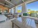 Outdoor patio area with comfortable seating and a modern coffee table at 1829 Tropical Palms Cir Cir, Kissimmee, FL 34747