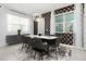 Modern dining room with marble table and gray chairs at 1829 Tropical Palms Cir Cir, Kissimmee, FL 34747