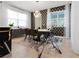 Bright dining room featuring a stylish geometric wallpaper at 1829 Tropical Palms Cir Cir, Kissimmee, FL 34747