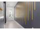 Modern entryway with geometric wall art and tile flooring at 1829 Tropical Palms Cir Cir, Kissimmee, FL 34747