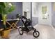 Bright entryway with stroller, console table, and modern decor at 1829 Tropical Palms Cir Cir, Kissimmee, FL 34747