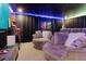 Home theater with plush seating and large screen at 1829 Tropical Palms Cir Cir, Kissimmee, FL 34747