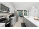 Modern kitchen with white countertops and stainless steel appliances at 1829 Tropical Palms Cir Cir, Kissimmee, FL 34747