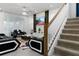 Living room with staircase, stylish decor, and comfortable seating at 1829 Tropical Palms Cir Cir, Kissimmee, FL 34747