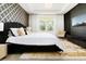 Main bedroom with a black velvet bed, gold accents, and a large window at 1829 Tropical Palms Cir Cir, Kissimmee, FL 34747