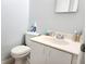 Bathroom with a toilet, sink, and vanity at 1855 Caralee Blvd # 2, Orlando, FL 32822