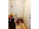 Small entryway with a bench and a childs tricycle at 1855 Caralee Blvd # 2, Orlando, FL 32822