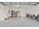 Garage with space for two bikes and storage shelving at 1867 Flora Pass Pl, Kissimmee, FL 34747