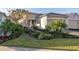 House exterior showcasing landscaping and curb appeal at 1867 Flora Pass Pl, Kissimmee, FL 34747