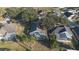 Aerial view showing home with private pool, and surrounding houses at 201 Steamboat Blvd, Davenport, FL 33897