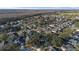 Wide aerial view of neighborhood and golf course at 201 Steamboat Blvd, Davenport, FL 33897