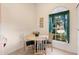Cozy kitchen nook with a round table and chairs, perfect for casual dining at 201 Steamboat Blvd, Davenport, FL 33897
