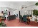 Spacious living room with a view of the pool and access to the backyard at 201 Steamboat Blvd, Davenport, FL 33897