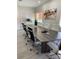 Modern community room with conference table and chairs at 2218 Grand Cayman Ct # 1335, Kissimmee, FL 34741