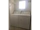 Convenient laundry room with side-by-side washer and dryer at 2218 Grand Cayman Ct # 1335, Kissimmee, FL 34741