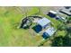 Aerial view showing a shed and small pond at 265 E Lake Shore Blvd, Kissimmee, FL 34744