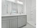 Bathroom boasts double vanity and a shower at 2749 Andes Way, Saint Cloud, FL 34769