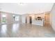 Spacious open-concept living area with seamless flow into the modern kitchen and dining area at 2849 Sw 137Th Ln, Ocala, FL 34473