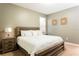 Spacious bedroom with king-size bed and nightstands at 2950 Buccaneer Palm Rd, Kissimmee, FL 34747