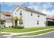 Two-story house with tile roof and landscaping at 2950 Buccaneer Palm Rd, Kissimmee, FL 34747