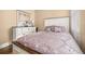 Bright bedroom with a double bed and dresser at 3061 Palermo Rose Way, Kissimmee, FL 34746