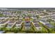 High-angle view of house with pool in a large community at 370 Burma St, Kissimmee, FL 34747