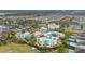 Aerial view of community with water park and homes at 370 Burma St, Kissimmee, FL 34747