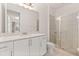 Bathroom boasts a vanity with granite countertop at 370 Burma St, Kissimmee, FL 34747