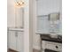 Small bathroom with vanity and window at 370 Burma St, Kissimmee, FL 34747