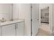 Clean bathroom with white vanity and granite countertop at 370 Burma St, Kissimmee, FL 34747
