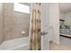 Bathroom with shower/tub combo and patterned shower curtain at 370 Burma St, Kissimmee, FL 34747