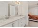 Double vanity bathroom with granite countertop at 370 Burma St, Kissimmee, FL 34747