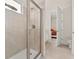 Bathroom with a large shower and tile flooring at 370 Burma St, Kissimmee, FL 34747