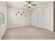 Spacious bedroom with double closets and carpeted floor at 370 Burma St, Kissimmee, FL 34747