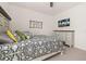 Bedroom featuring a mounted TV and dresser at 370 Burma St, Kissimmee, FL 34747