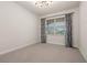 Bright bedroom with neutral walls and carpeted floor at 370 Burma St, Kissimmee, FL 34747