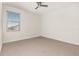 Simple bedroom with neutral walls and carpet at 370 Burma St, Kissimmee, FL 34747