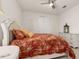 Bedroom with a queen bed and ceiling fan at 370 Burma St, Kissimmee, FL 34747