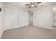 Bedroom with double closets and access to bathroom at 370 Burma St, Kissimmee, FL 34747