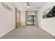 Bedroom with pool view, neutral carpeting, and ceiling fan at 370 Burma St, Kissimmee, FL 34747