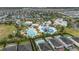 Aerial view of community pool with water slides and leisure areas at 370 Burma St, Kissimmee, FL 34747