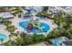 Resort-style pool with water slides and a splash pad at 370 Burma St, Kissimmee, FL 34747