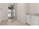 Bright and airy entryway with white cabinets and tile floors at 370 Burma St, Kissimmee, FL 34747