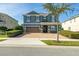 Beautiful two-story house with a two-car garage at 370 Burma St, Kissimmee, FL 34747