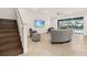 Gathering room with view of pool and sliding doors at 370 Burma St, Kissimmee, FL 34747