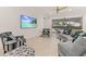Open living space with sectional sofa and pool view at 370 Burma St, Kissimmee, FL 34747