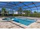 Inviting screened pool and spa with paver deck at 370 Burma St, Kissimmee, FL 34747